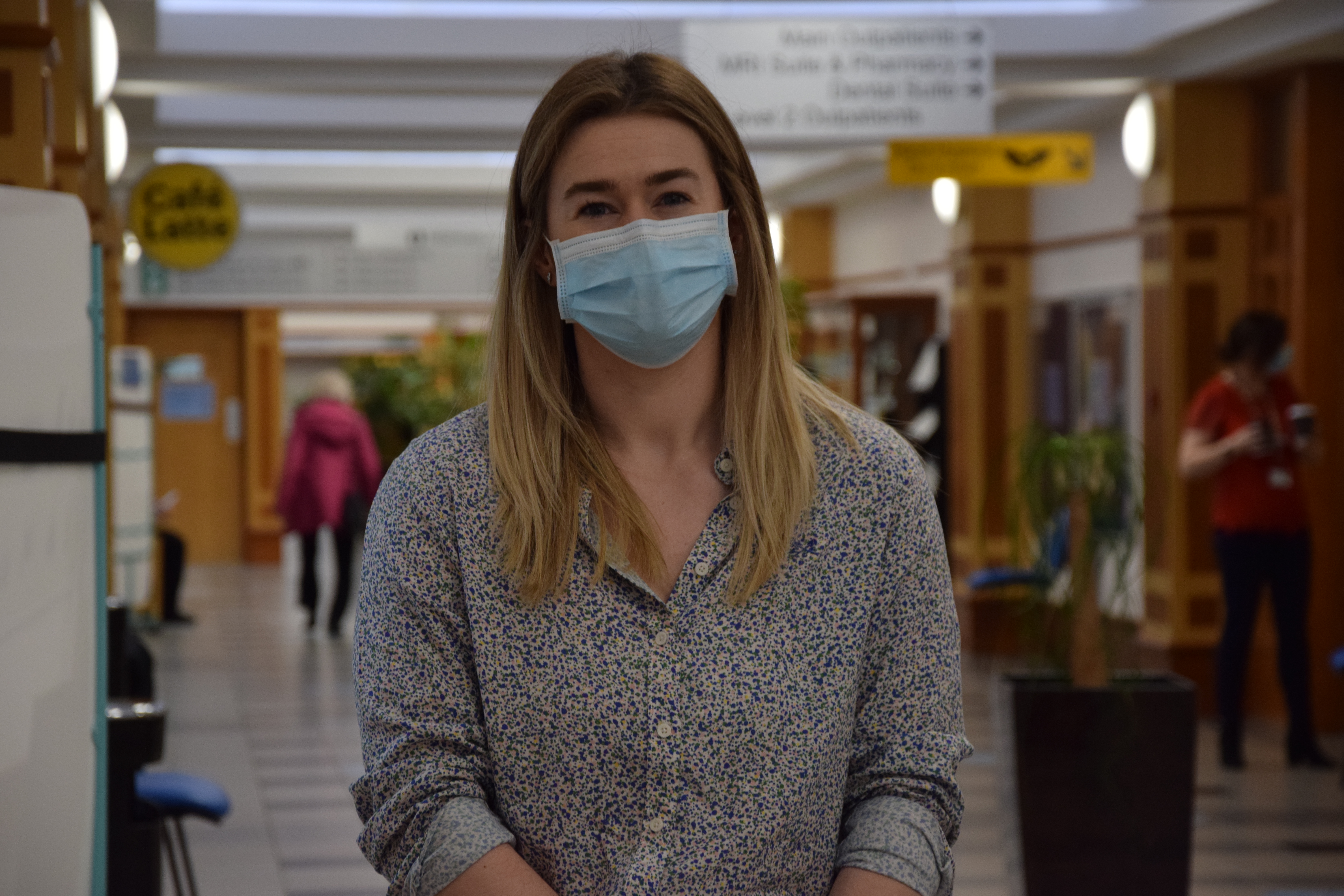 Rebecca Meen stands with face mask on in NHS Golden Jubilee University National Hospital.