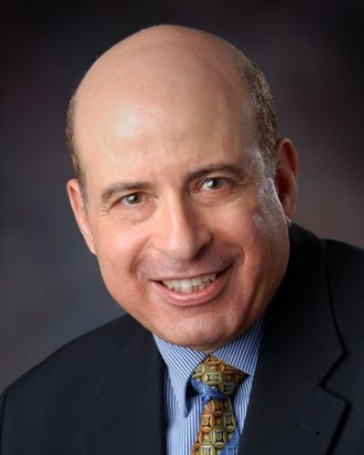 Professor Hany Eteiba smiling.