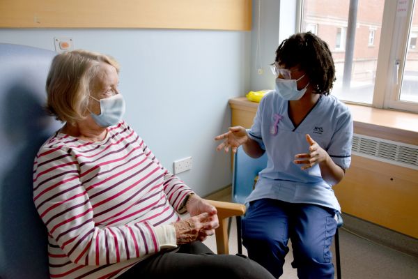 nurse with patient (19) brighter and mask.jpg